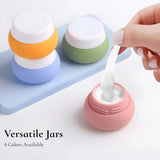 Lyrovo 30ml Silicone Travel Containers for Toiletries, Set of 4 - BPA-Free Leakproof Refillable Cosmetic Jars with Clear Bag, Name Stickers, and Scoops for Face, Hand & Body Creams (Pastel)